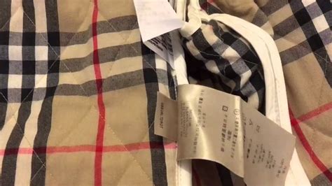 how to tell a fake burberry quilted jacket|authenticity of Burberry coat.